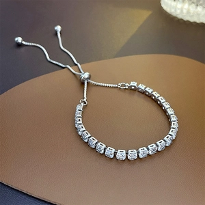 Adjustable geometric crystal bracelet with silver pull-chain design and square cubic zirconia