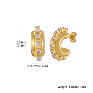 Detail view of gold C-shaped hoop earrings with clear zircon stones and measurements