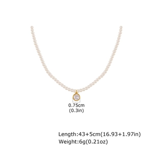 Elegant stainless steel pearl necklace with a circular zircon pendant in golden finish