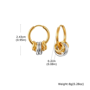 Detailed view of two-tone stainless steel hoop earrings with size measurements in inches