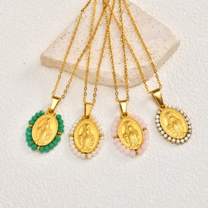 Golden Virgin Mary oval pendants with emerald zircon and pearls on cross chains