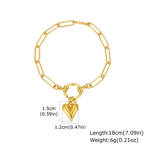 Detailed view of a gold heart charm bracelet with rectangular link chain and spring clasp