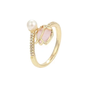Adjustable tulip ring with pink stone and white pearl in gold finish with zircon accents