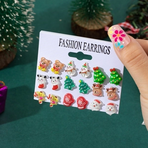 Christmas stud earring set featuring nine pairs of cute festive resin cartoon designs