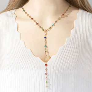 Golden Y-shaped long necklace with colorful glass stones and elegant tassel design
