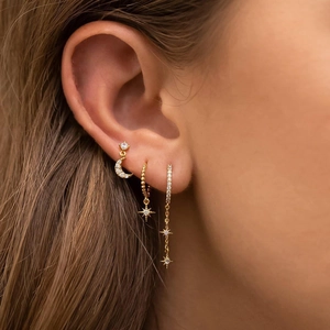 Three-piece gold star and moon earring set with cubic zirconia for multiple piercings