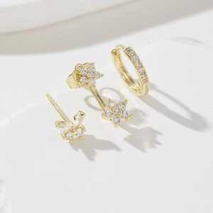 Detailed set of butterfly and flower earrings with sparkling cubic zirconia in gold