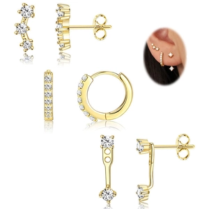 Ensemble de trois paires de boucles d'oreilles dorées avec zircons et créoles chic