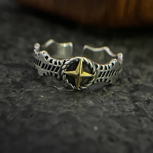 Vintage starburst open ring with distressed silver finish and punk aesthetic