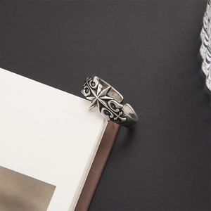 Vintage oxidized silver hexagram ring with gothic cross relief patterns on white card