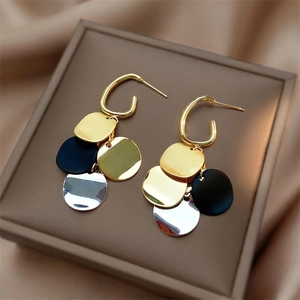 Vintage layered tricolor metallic drop earrings with gold silver and black round discs