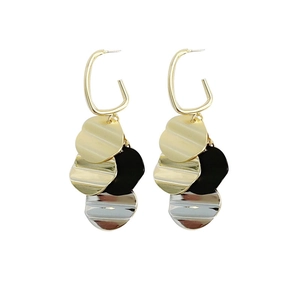 Modern geometric multi-layer drop earrings with gold, black, and silver metallic discs
