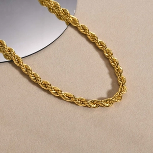 Chunky 8mm 18K gold-plated stainless steel rope chain necklace for women on beige background