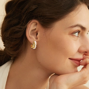Fashionable C-shaped gold pearl earrings for women with vintage floral texture design