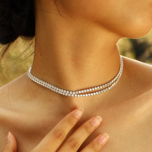 Elegant double-row tennis necklace with claw-set zircon crystals on a silver chain