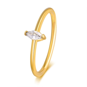 Macro detail of gold thin ring featuring a marquise-cut white zircon in a minimalist style