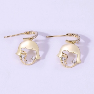 Detailed view of gold earrings with cubic zirconia and S925 silver needle stamp