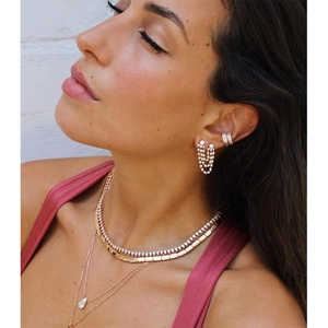 Exaggerated gold copper earrings and layered necklace set with sparkling rhinestones