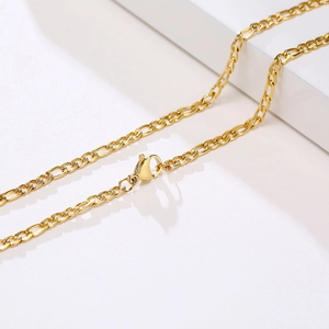 Minimalist 3mm gold stainless steel Figaro chain necklace featuring a secure lobster clasp