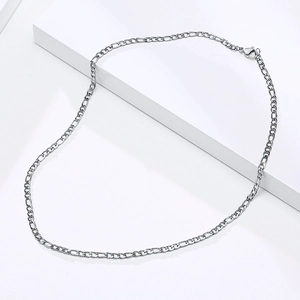 Detailed close-up of silver 3mm Figaro chain necklace with a secure lobster clasp
