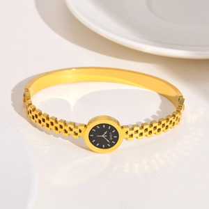 Gold stainless steel watch-style bangle with hollow checkered pattern and black LOVE dial