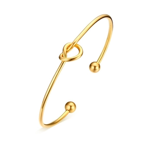Bracciale rigido aperto a nodo in acciaio inossidabile dorato con terminali a sfera