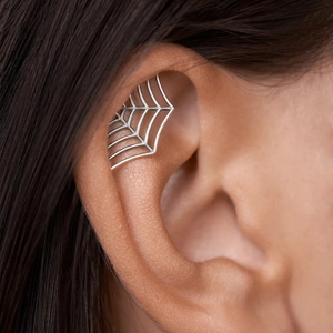 Gothic silver spider web ear cuff with hollow geometric lines for Halloween punk style