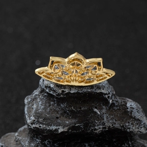 Gothic gold lotus spider web earrings for Halloween on black volcanic stone
