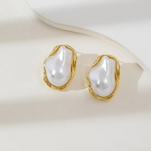 French vintage baroque pearl earrings with textured gold metal edges and elegant design