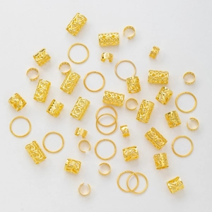 80pcs gold hair jewelry set featuring hollow braid rings and dreadlock accessories on white