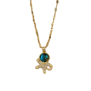 Luxurious astronaut necklace with blue starry glass and pave-set white diamonds for women