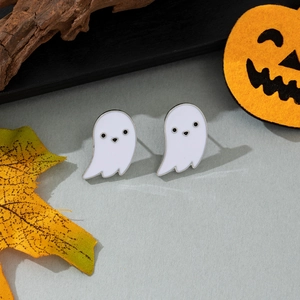 Halloween white ghost stud earrings with enamel finish on a festive autumn background