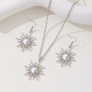Bohemian sunburst jewelry set with necklace and hook earrings in silver finish