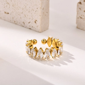 Detail of 18K gold open ring featuring marquise-cut zircons in a crown-like setting