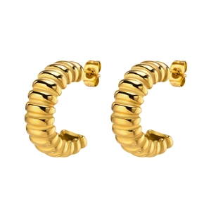Golden stainless steel C-shape croissant hoop earrings with a ribbed twist design