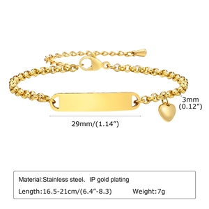 Detail of adjustable gold stainless steel bracelet with blank engravable plate and heart charm