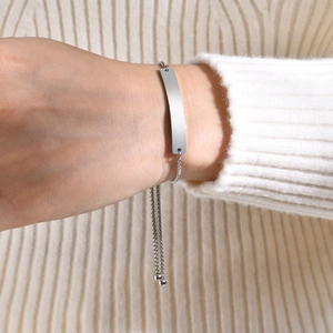 Adjustable stainless steel ID bar bracelet with blank polished curved plate for engraving
