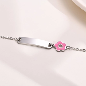 Polished stainless steel ID bracelet for women with pink flower charm and engravable plate