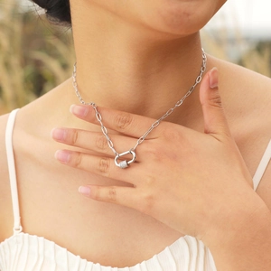 Silver-toned carabiner pendant necklace with micro-pave cubic zirconia on an oval link chain