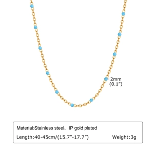 Detail view of gold stainless steel necklace with 2mm blue beads and adjustable chain