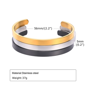 Detail view of 5mm stainless steel cuff bangles in gold, silver and black finish