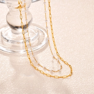 Collier en Acier Inoxydable à Double Couche avec Künstliche Perles Or Chaîne Trombone Ras du Cou pour Femmes Bijoux de Mode