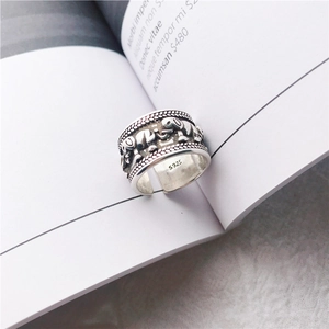 Vintage S925 silver wide open ring featuring embossed elephant patterns and woven rope edges
