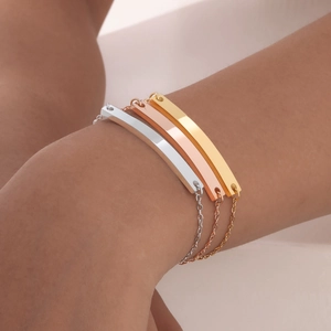 Minimalist curved bar bracelet set in gold, rose gold, and silver stainless steel