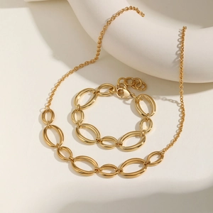 Ensemble collier et bracelet en acier inoxydable plaqué or 18 carats à maillons
