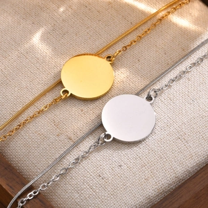 Double-layered stainless steel bracelet with blank round charm in gold and silver finish