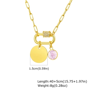 Detail of 18K gold chain with carabiner clasp, oval tag, and pink crystal pendant