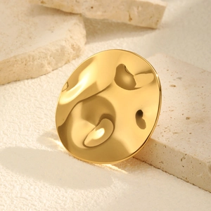 Minimalist irregular round golden stainless steel brooch with a hammered metal texture