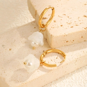 Gold stainless steel hoop earrings with lily of the valley pearl charms on stone base