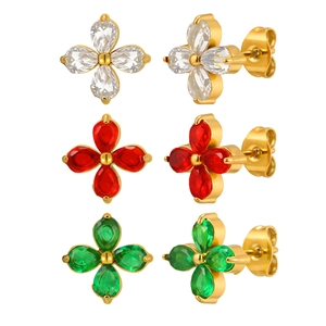 Three pairs of floral stud earrings in white, red and emerald green with gold plating